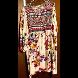 White dress with bright floral coloring